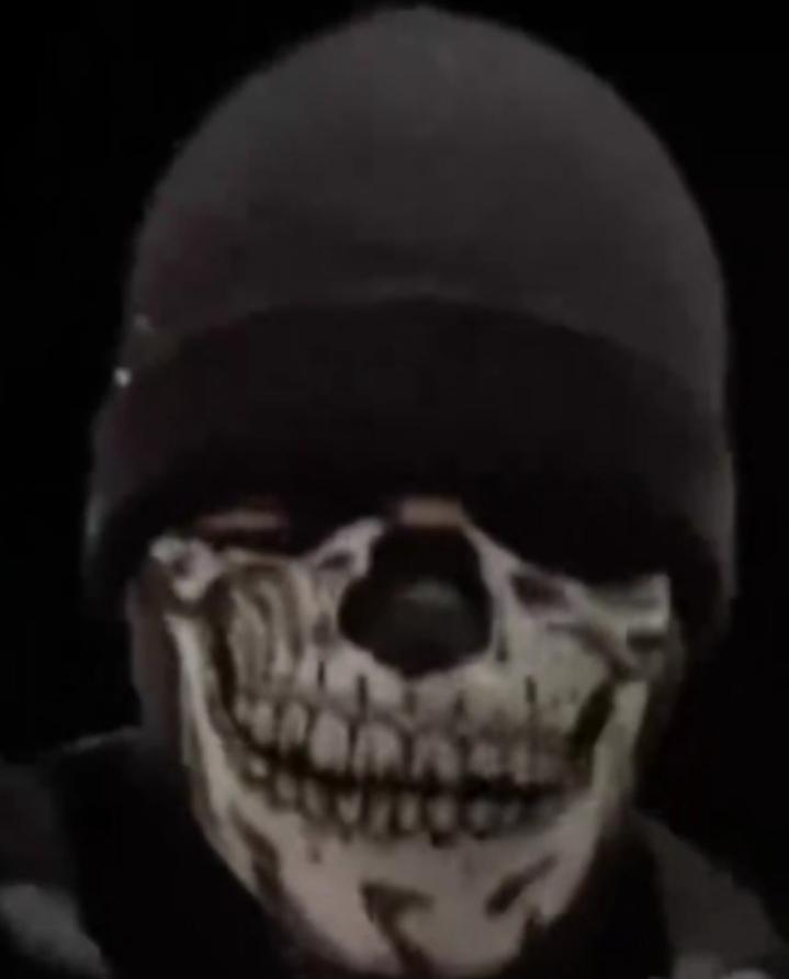 Peter Patrick wearing a nazi siege mask in Coos Bay